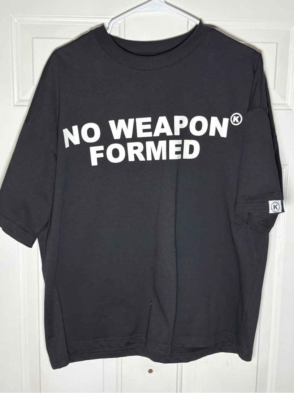 Mishka Black Kids' Tee with White 'NO WEAPON FORMED' Graphic